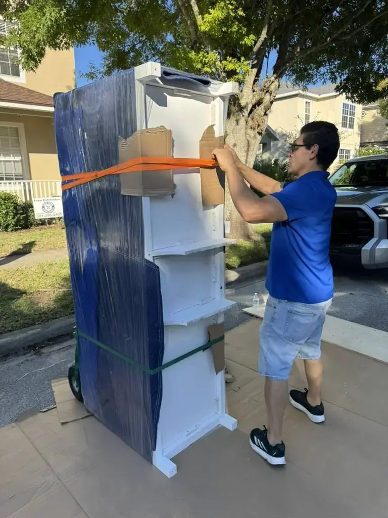 Toro Movers crew securing furniture on a real local move in Central Florida